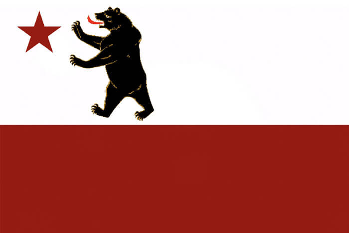 a horizontal bicolor of white and red, the white upper half charged with a red star and a bear on its hind legs